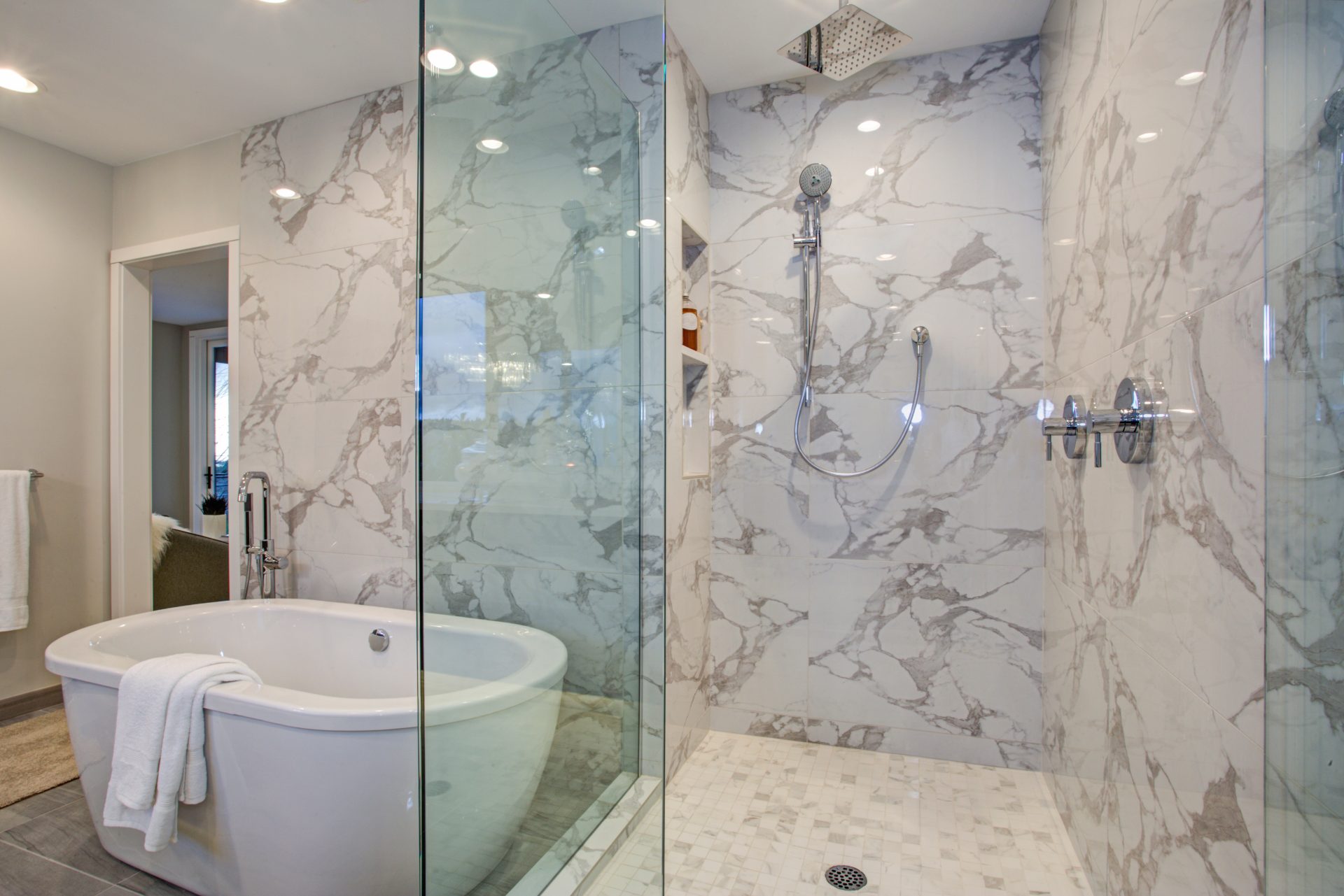 white and gray calcutta marble bathroom design